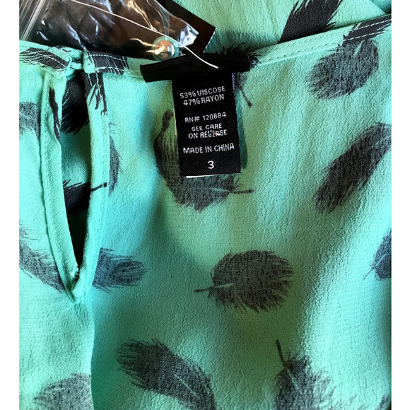 Torrid Aqua Blouse with Ruffled Hem and Black Feather Print size 3x - Picture 5 of 8